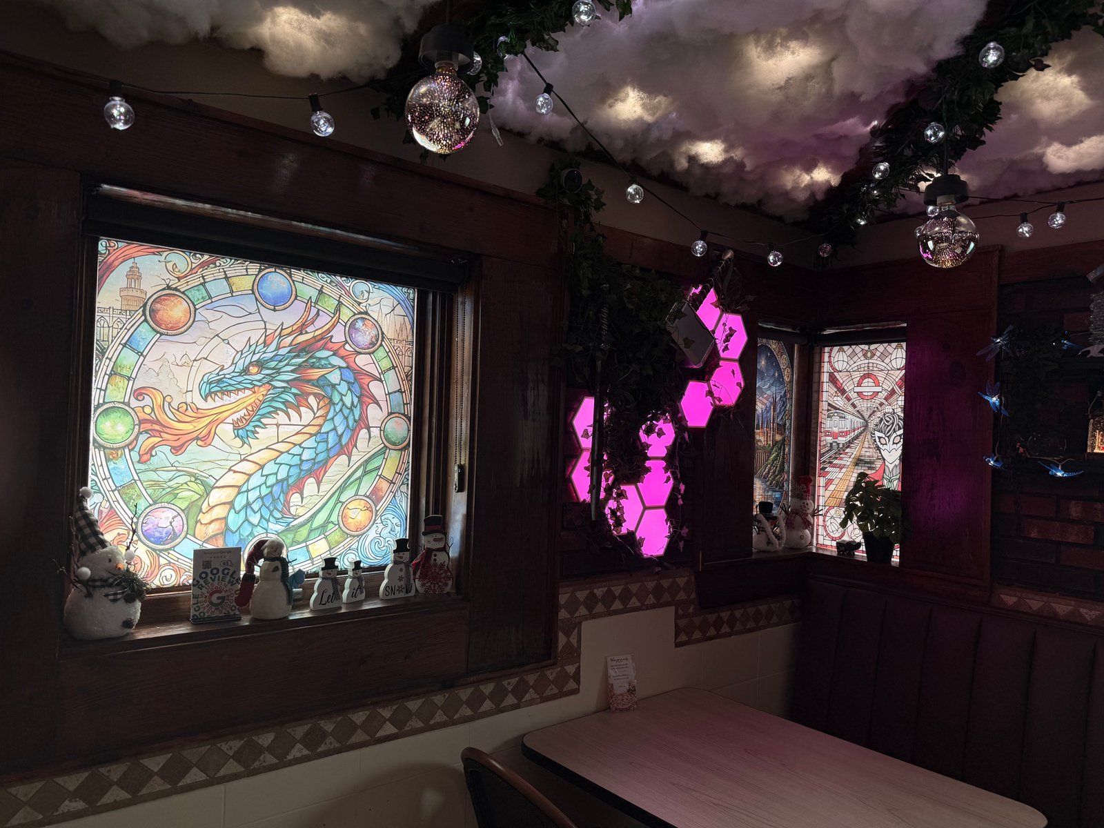 Dragon stained glass window with cloud ceiling